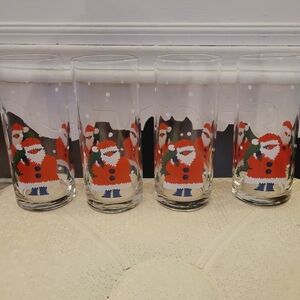 set of 4 Christmas drinking glasses, tumblers. Santa Clause with wreath and whit